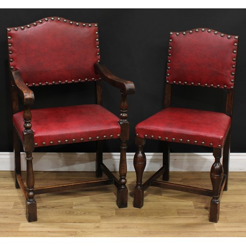 109 - A set of four Cromwellian Revival style oak dining chairs, 93cm high, 47cm wide, the seat 36cm deep;... 