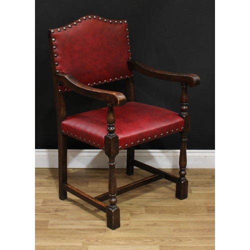 109 - A set of four Cromwellian Revival style oak dining chairs, 93cm high, 47cm wide, the seat 36cm deep;... 