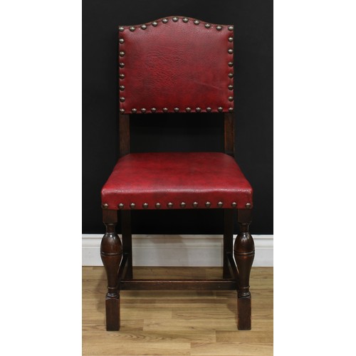 109 - A set of four Cromwellian Revival style oak dining chairs, 93cm high, 47cm wide, the seat 36cm deep;... 