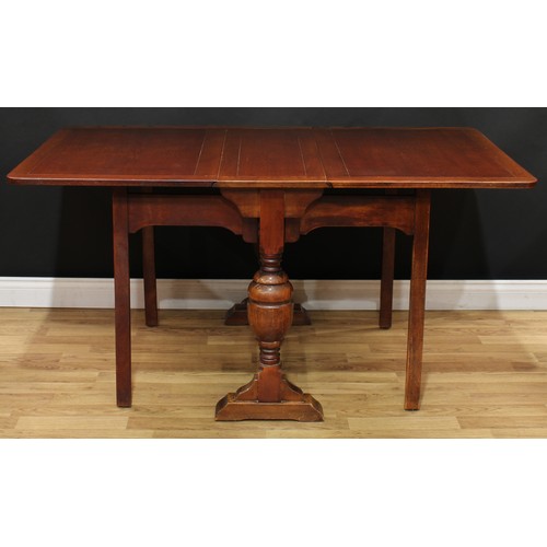 112 - An oak drop-leaf dining table, 75cm high, 35cm opening to 152.5cm long; a set of four dining chairs,... 