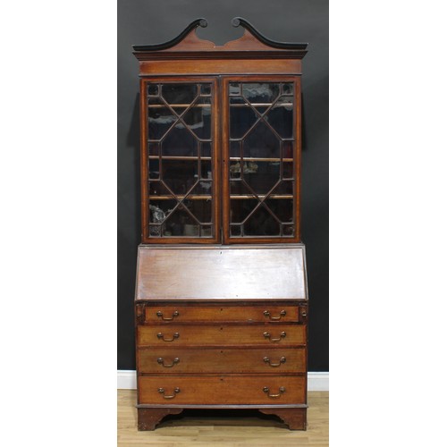 113 - A Sheraton Revival satinwood crossbanded mahogany and marquetry bureau bookcase, swan neck pediment ... 