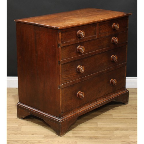 117 - A 19th century oak chest, slightly oversailing rectangular top above two short and three long gradua... 