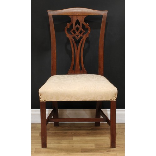 201 - A set of four Chippendale Revival mahogany dining chairs, each with a shaped and pierced splat, drop... 