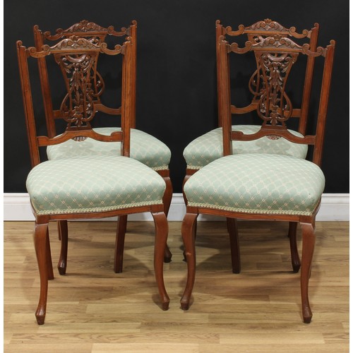 209 - A set of four Victorian walnut salon chairs, stuffed-over seats, 88.5cm high, 46cm wide, the seat 37... 