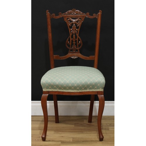 209 - A set of four Victorian walnut salon chairs, stuffed-over seats, 88.5cm high, 46cm wide, the seat 37... 