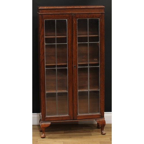 216 - An Arts & Crafts design open bookcase, 128cm high, 55cm wide, 19.5cm deep; an early-mid 20th century... 