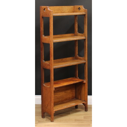 216 - An Arts & Crafts design open bookcase, 128cm high, 55cm wide, 19.5cm deep; an early-mid 20th century... 