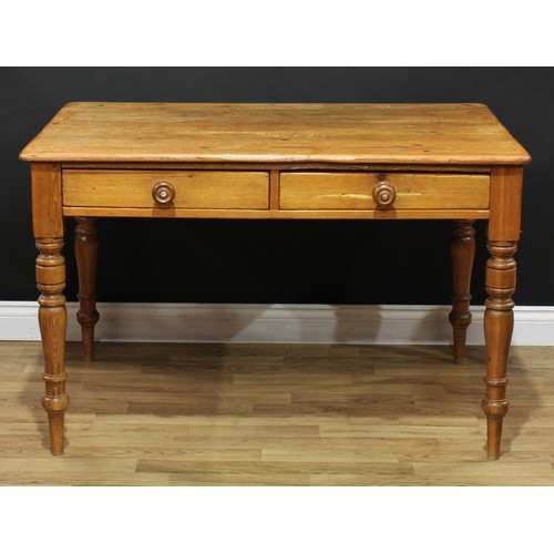 603 - A farmhouse pine kitchen dining table, two short drawers to frieze, turned legs, 76cm high, 121cm lo... 