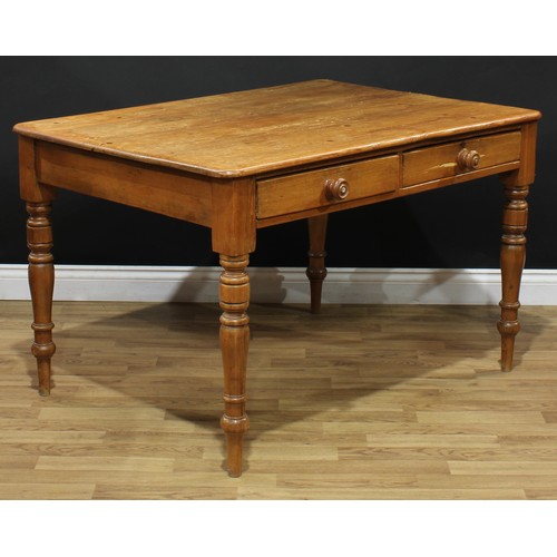 603 - A farmhouse pine kitchen dining table, two short drawers to frieze, turned legs, 76cm high, 121cm lo... 