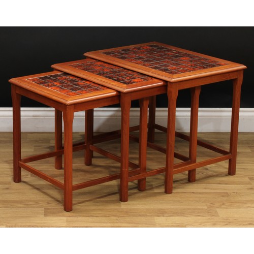 606 - A nest of three Danish retro mid-20th century tile-top occasional tables, the largest 48cm high, 57c... 