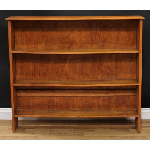 624 - An oak wall-hanging bookcase or wall shelf, 63.5cm high, 76.5cm wide, 16.5cm deep; an open bookcase,... 