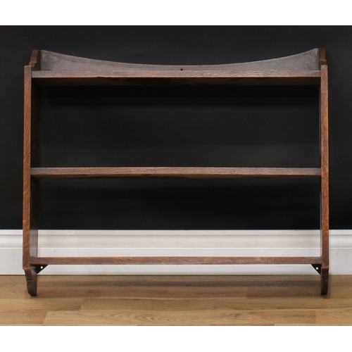 624 - An oak wall-hanging bookcase or wall shelf, 63.5cm high, 76.5cm wide, 16.5cm deep; an open bookcase,... 