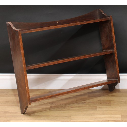 624 - An oak wall-hanging bookcase or wall shelf, 63.5cm high, 76.5cm wide, 16.5cm deep; an open bookcase,... 