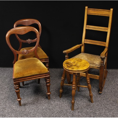 627 - A country house ladder back rocking chair, rush seat; a similar stool; a pair of Victorian balloon b... 