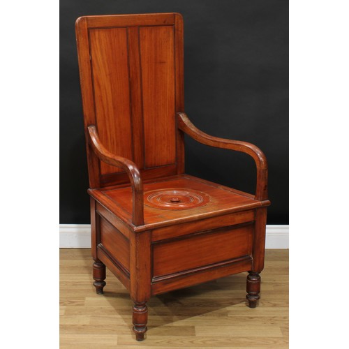 628 - A late Victorian mahogany open arm commode chamber chair, rectangular back, downswept arms, draught ... 