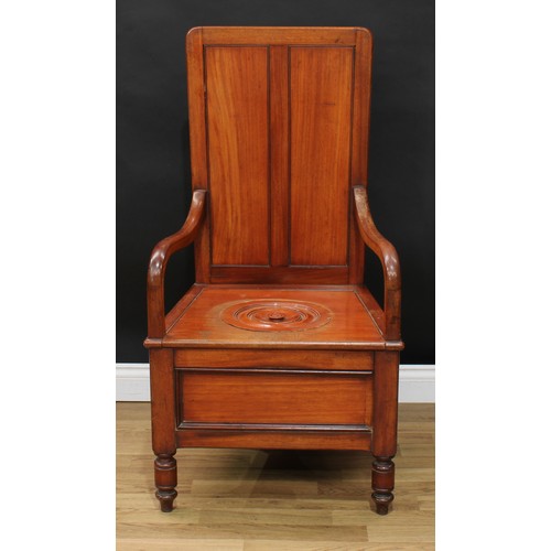 628 - A late Victorian mahogany open arm commode chamber chair, rectangular back, downswept arms, draught ... 