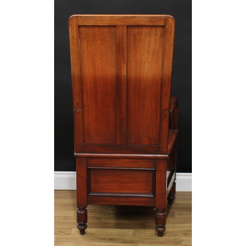 628 - A late Victorian mahogany open arm commode chamber chair, rectangular back, downswept arms, draught ... 