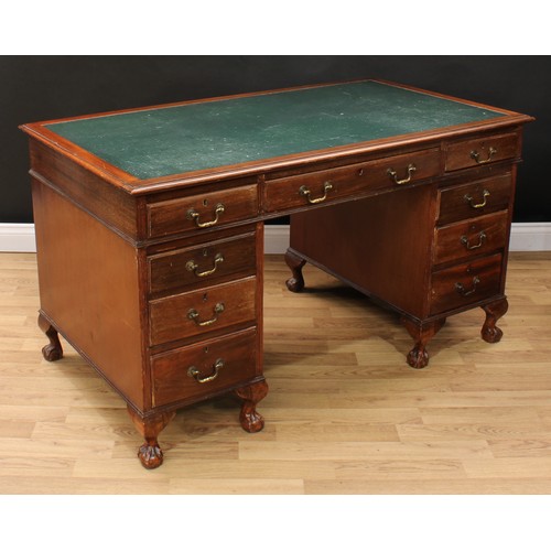 630 - An early-mid 20th century mahogany twin pedestal desk, rectangular top with inset writing surface ab... 