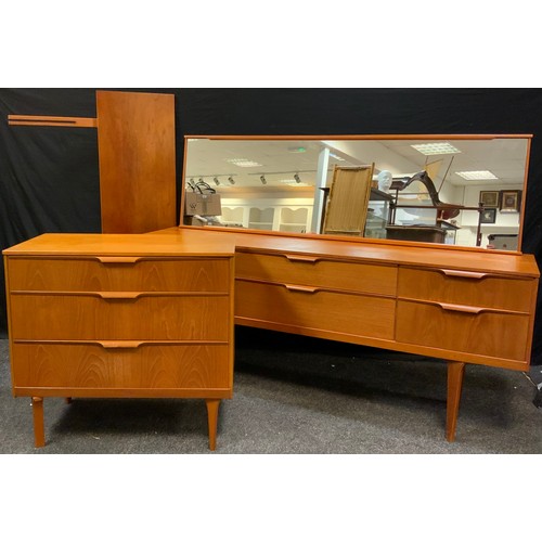 226 - A three piece teak Austin suite bedroom suite, three drawer chest, 80cm wide, long dressing table, 1... 