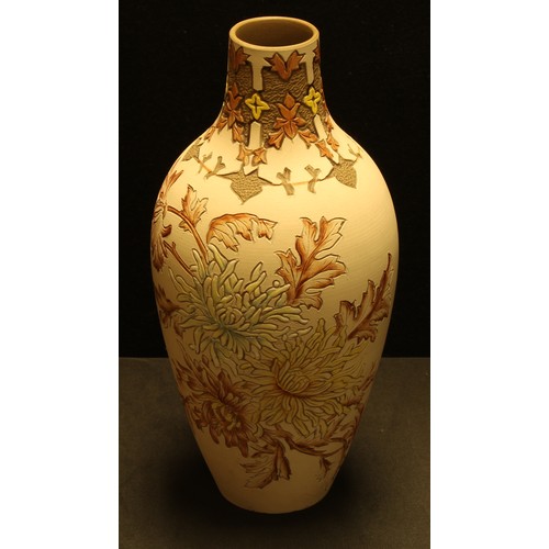 645 - A Lovetts Langley Ware slender ovoid vase, incised with stylised chrysanthemum blossom in pastel sha... 