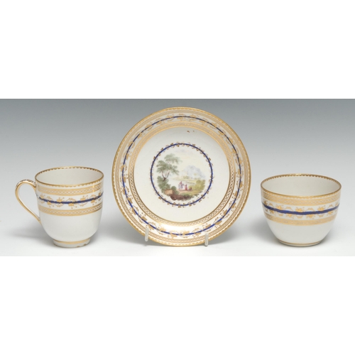 700 - A Derby tea bowl, coffee cup and saucer, painted by Zachariah Boreman, in polychrome enamels and was... 