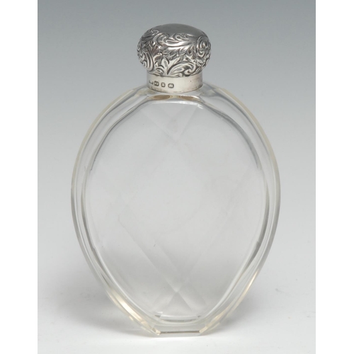 237 - A Victorian silver mounted clear glass faceted tear shaped scent bottle, domed screw-fitting cover c... 