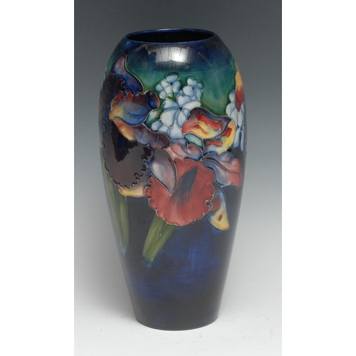 448 - A Moorcroft Iris pattern slender ovoid vase, 25.5cm high, impressed marks, monogrammed, c. 1950