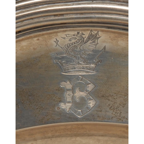 322 - Paul Storr - an early Victorian silver shaped circular dinner plate, engraved with the crest of Best... 