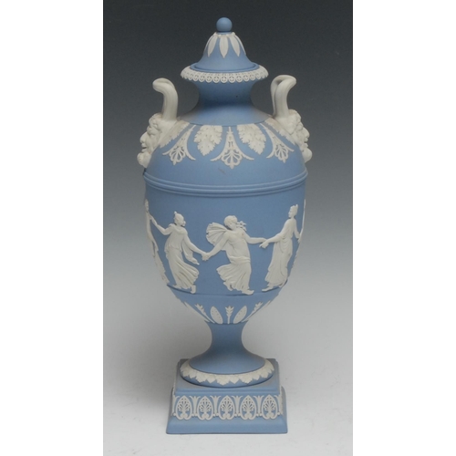 426 - A Wedgwood Jasperware pedestal ovoid vase, typically sprigged in white with neo-classical figures da... 