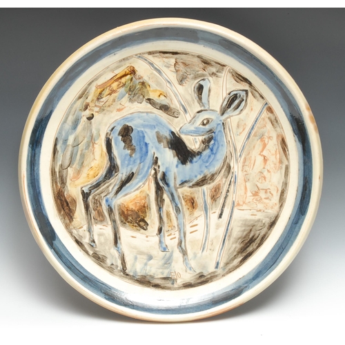 405 - A substantial Studio Pottery circular charger, incised with a faun, on tones of blue, 51cm diam, ind... 