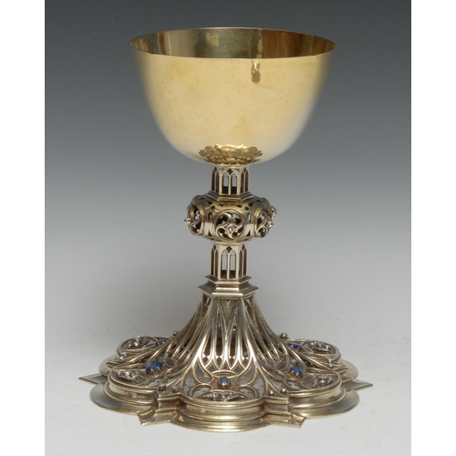 95 - A fine Gothic Revival diamond and sapphire mounted silver-gilt ecclesiastical Communion chalice, the... 