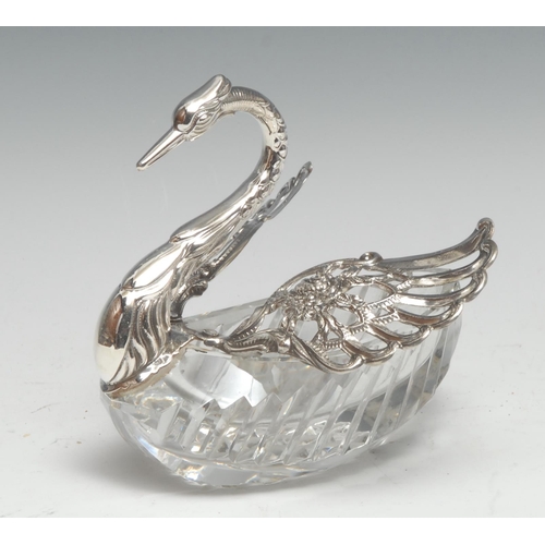 309 - An Italian silver and clear glass novelty dish, as a swan, 13cm long, import mark for London 1992