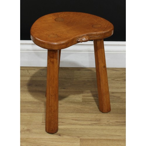 1971 - Robert Thompson, Mouseman of Kilburn - an oak stool, of staked construction, adzed kidney shaped top... 