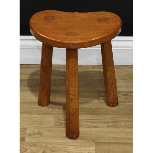 1971 - Robert Thompson, Mouseman of Kilburn - an oak stool, of staked construction, adzed kidney shaped top... 