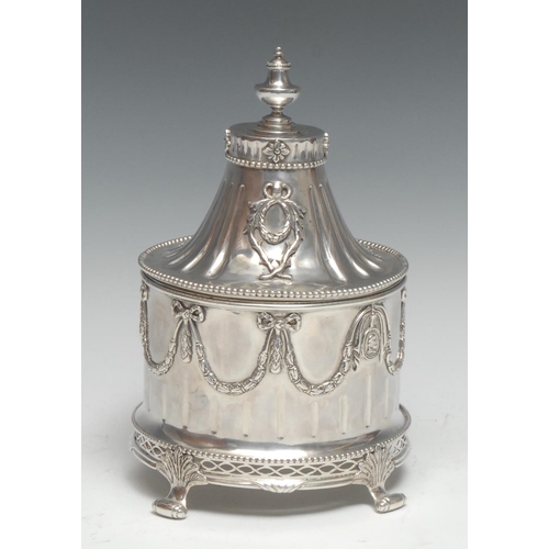 94 - A Dutch Neo-Classical silver circular tobacco box, lofty domed cover applied with ribbon-tied swags,... 