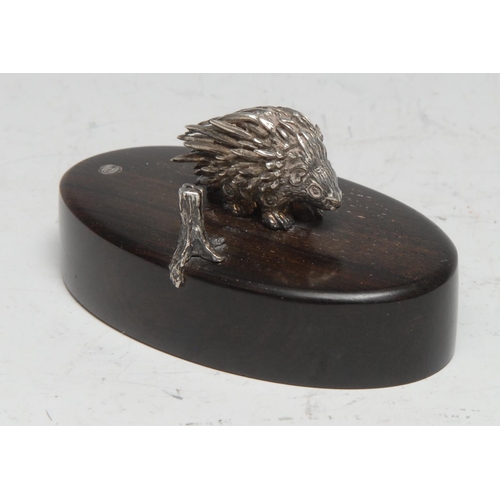 321 - Patrick Mavros - a silver model of a porcupine, hardwood base, 6cm wide