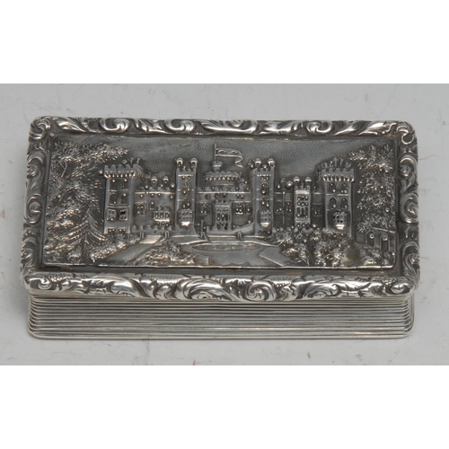 253 - A William IV silver rectangular castle top snuff box, hinged cover with a view of Windsor Castle, re... 