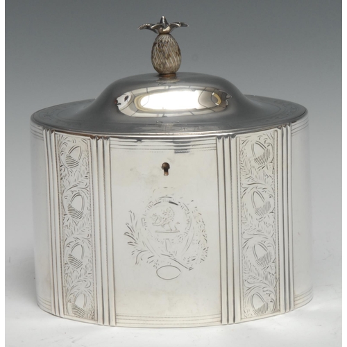 103 - A George III Provincial silver oval tea caddy, hinged domed cover with pineapple finial, bright-cut ... 