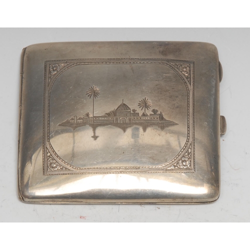 307 - An Iraqi silver curved rounded rectangular cigarette case, engraved with a dhow and a Middle Eastern... 