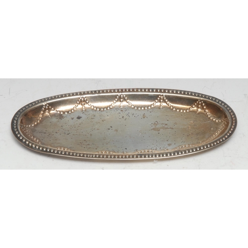 102 - A George III Irish silver oval spoon tray, beaded swag border, 18.5cm wide, Matthew West, Dublin c.1... 