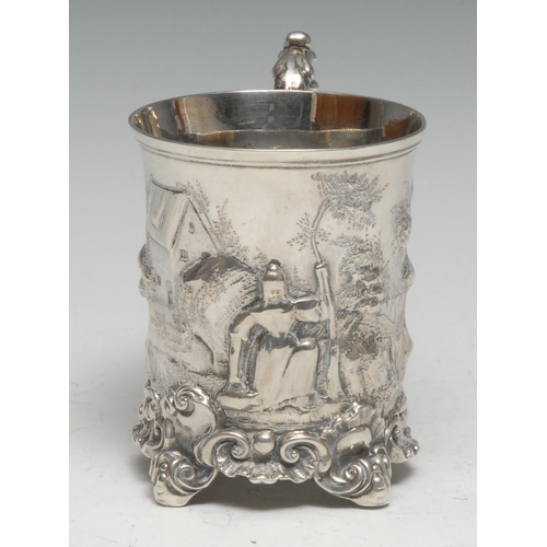 281 - An early Victorian Rococo Revival silver mug, cast with a farmyard, acanthus scroll handle, rocaille... 