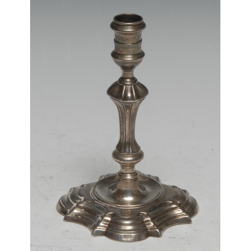 98 - A George II cast silver taper stick, knopped pillar, shaped square base, 11cm high, London 1747, 3.7... 