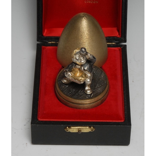 329 - Stuart Devlin (1931 - 2018) - an Elizabeth II silver-gilt and silver surprise egg, Little Jack Horne... 