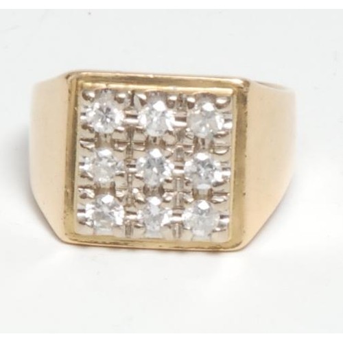 369 - A gentleman's nine stone diamond signet ring, panel set with round brilliant cut diamonds, total est... 