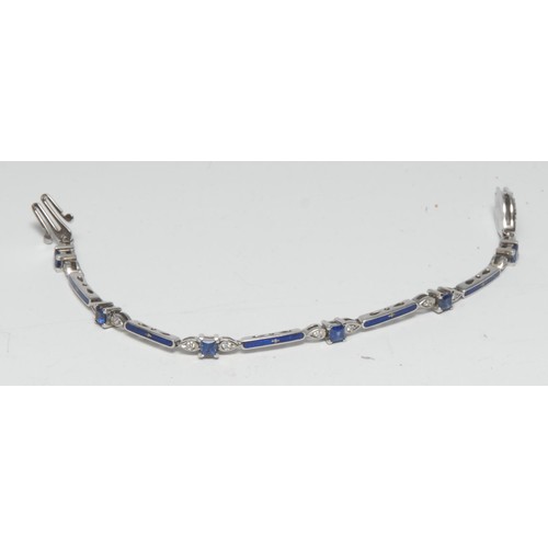 361 - A Faberge limited edition 18ct white gold sapphire, diamond and blue enamel bracelet, inset with twe... 