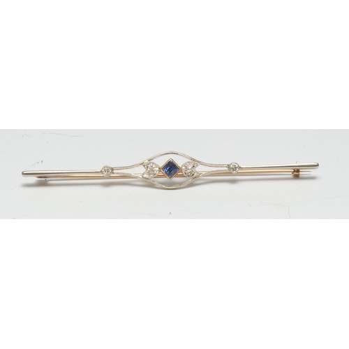 352 - A diamond and sapphire target panel brooch, central square cut sapphire within open cast lozenge fra... 