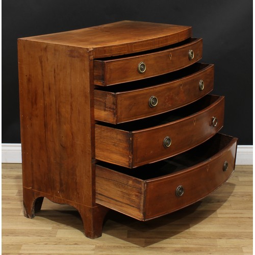 1980 - A George IV mahogany bow front chest, flush top above four long graduated cockbeaded drawers, inlaid... 