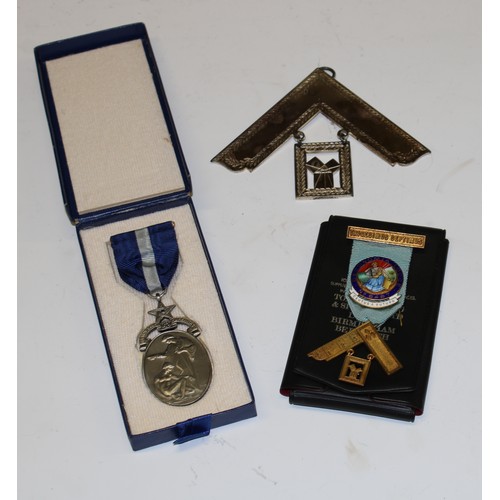 649 - Freemasonry - a base metal and enamel jewel, Oeconomia Lodge N0. 5487; two others similar (3)