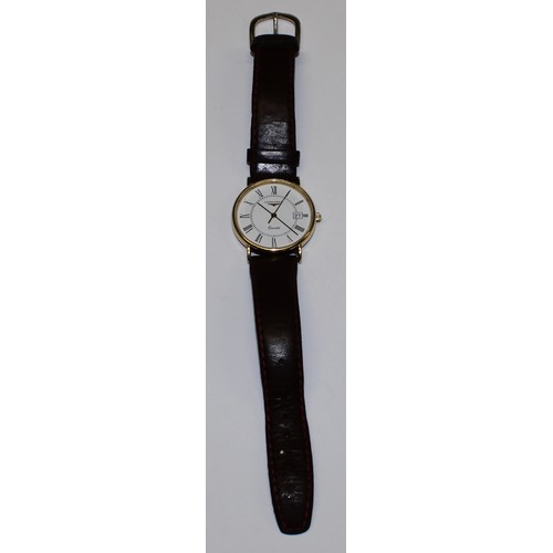 653 - A Longines watch, white dial, Roman numerals, date aperture, centre seconds, brown leather strap, bo... 