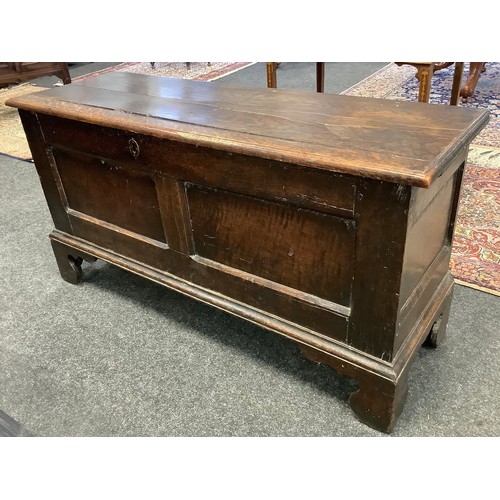 119 - A late 18th/early 19th century two-panel oak blanket chest, 118cm wide x 61.5cm tall x 40cm deep.